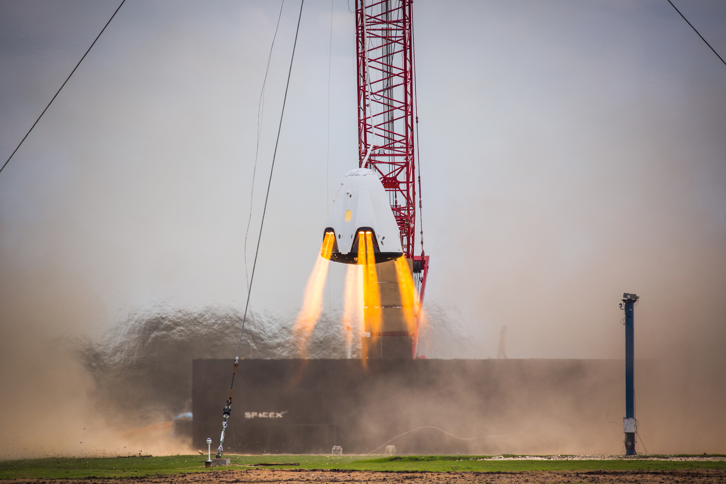  SpaceX tests the Crew Dragon's hover capability in Texas in their efforts to propulsively land the craft in the future. Photo Credit: SpaceX 