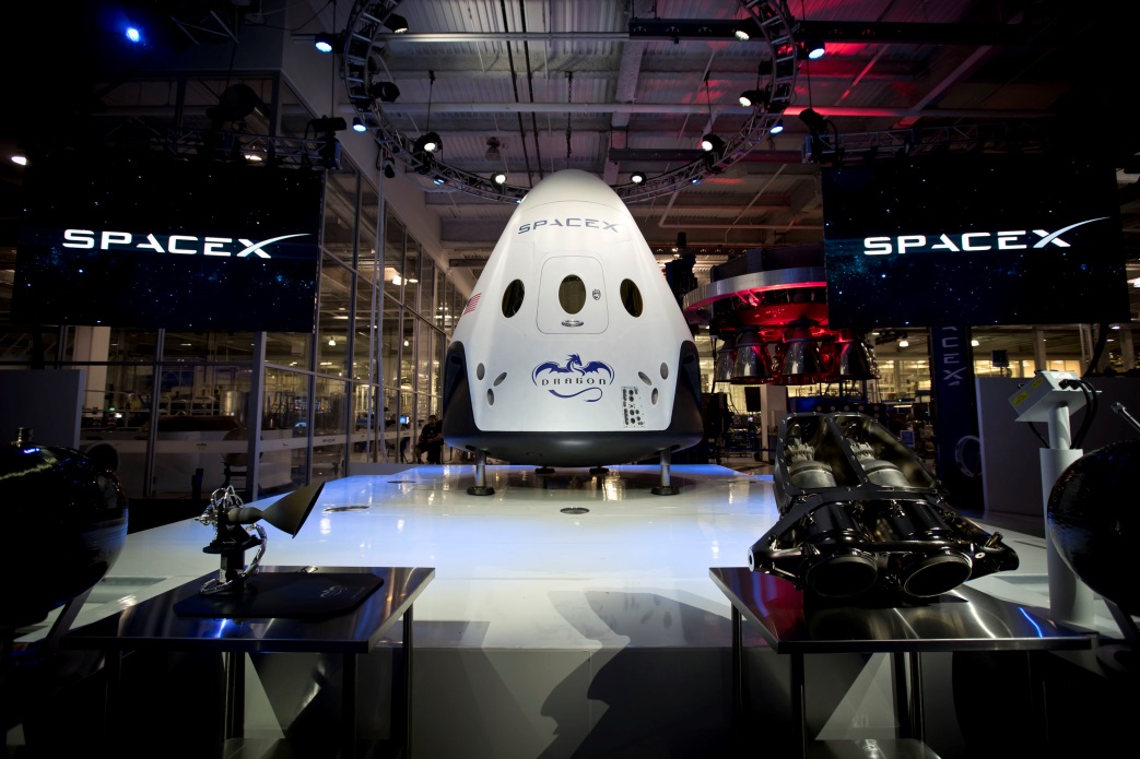  The Crew Dragon is unveiled at SpaceX headquarters in May 2014. Photo Credit: SpaceX 