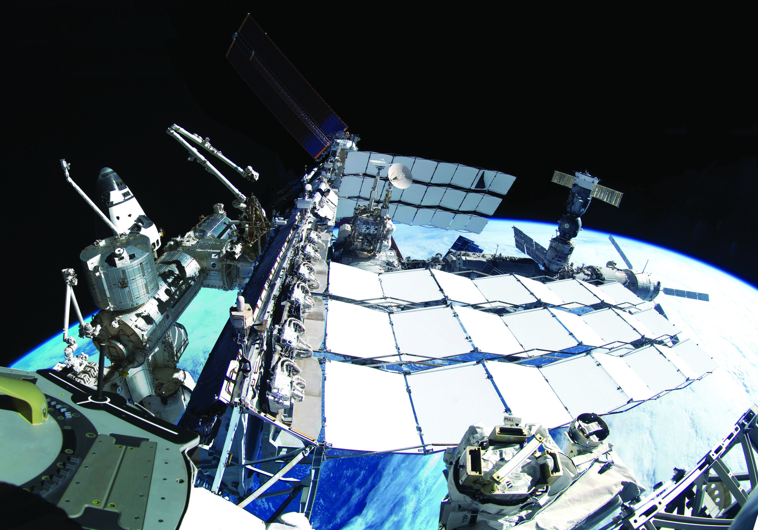 An astronauts view of a space shuttle docked. Photo Credit: NASA