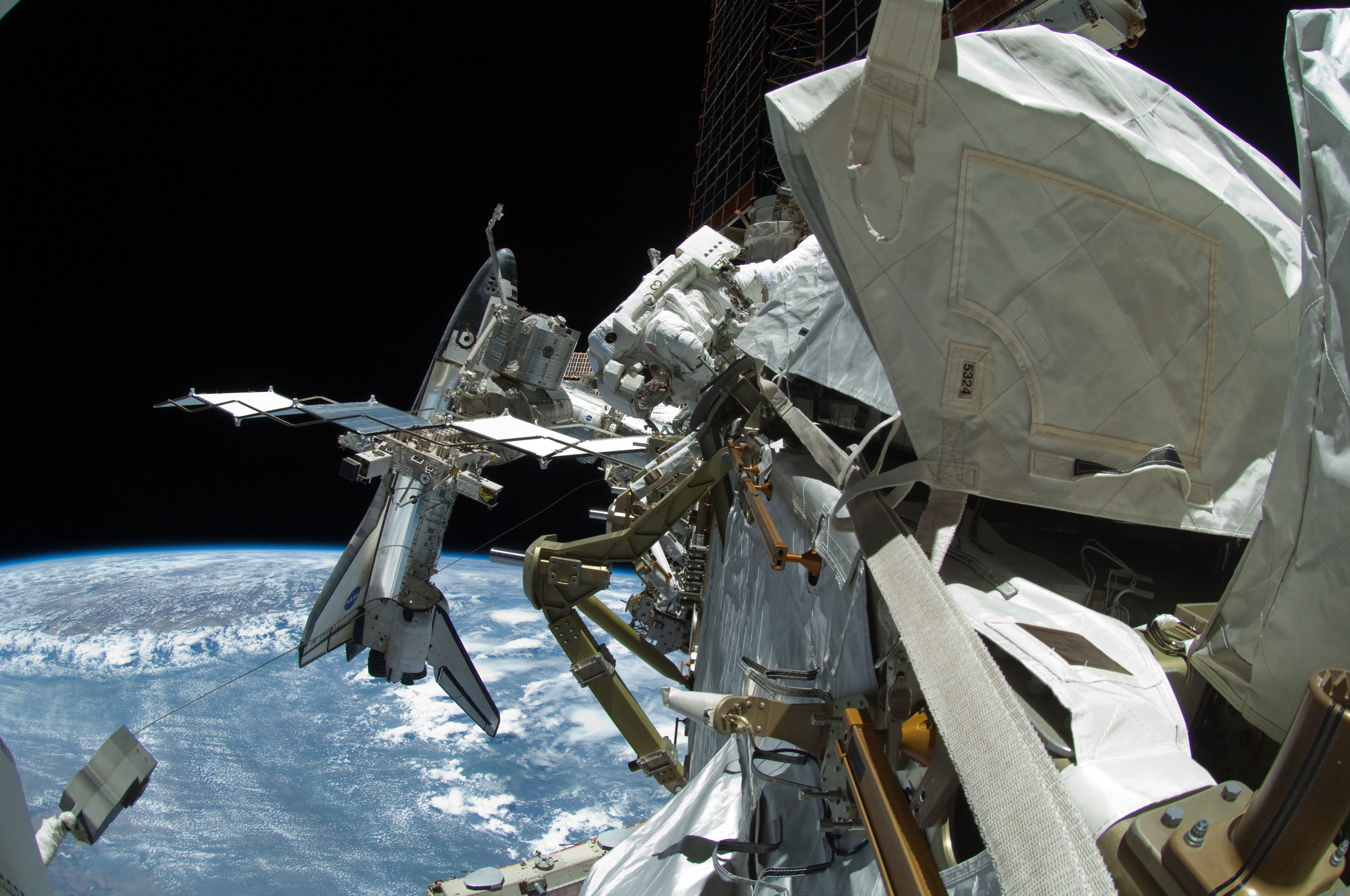  An astronauts view of a space shuttle docked. Photo Credit: NASA 