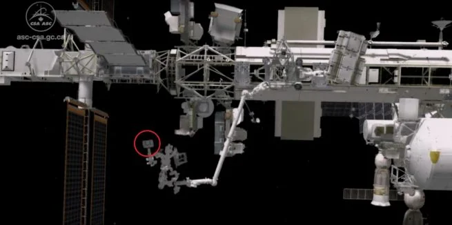 Using Dextre, ground-based robotics teams remotely swapped out nickel-hydrogen batteries with new lithium-ion units (red circle) connected to the station’s 3A power channel. Image Credit: NASA TV