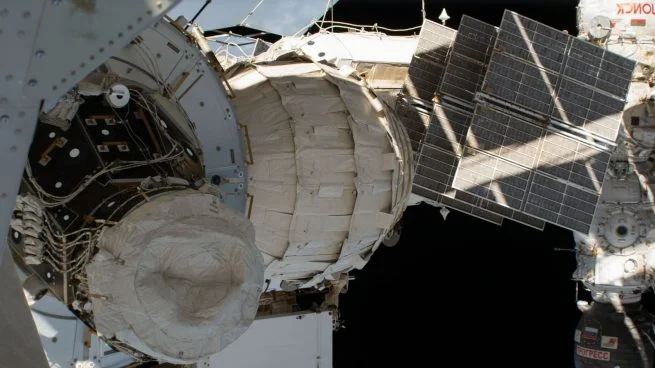 PMA-3, left, currently resides on the port side of the Tranquility module. Photo Credit: NASA