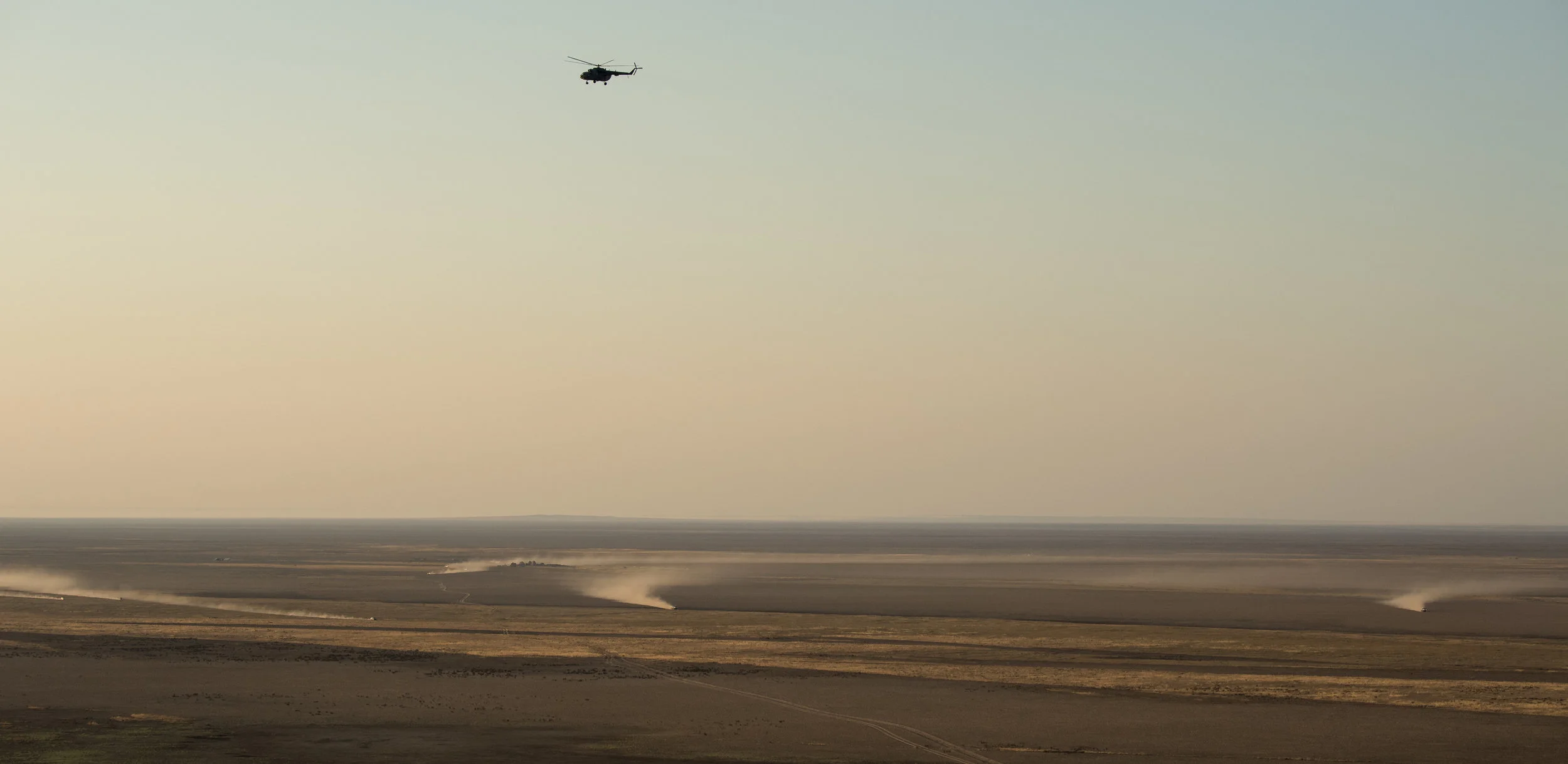 Search and Rescue teams travel to the landing zone. Photo Credit: Bill Ingalls / NASA