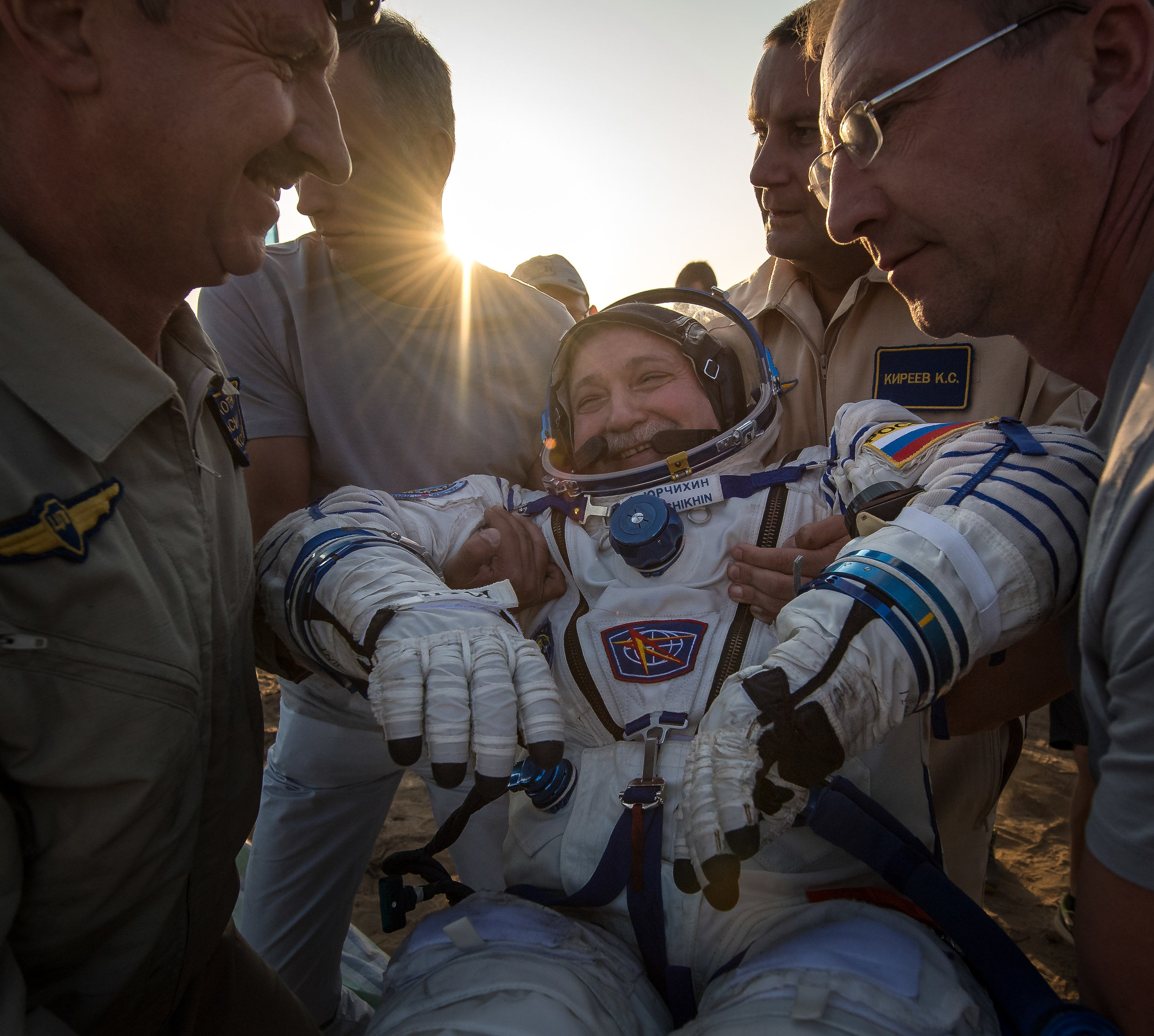  Fyodor Yurchikhin is the first to be helped out of the Soyuz MS-04 spacecraft just minutes after he and NASA astronauts Peggy Whitson, and Jack Fischer landed. Photo and Caption Credit: Bill Ingalls / NASA 