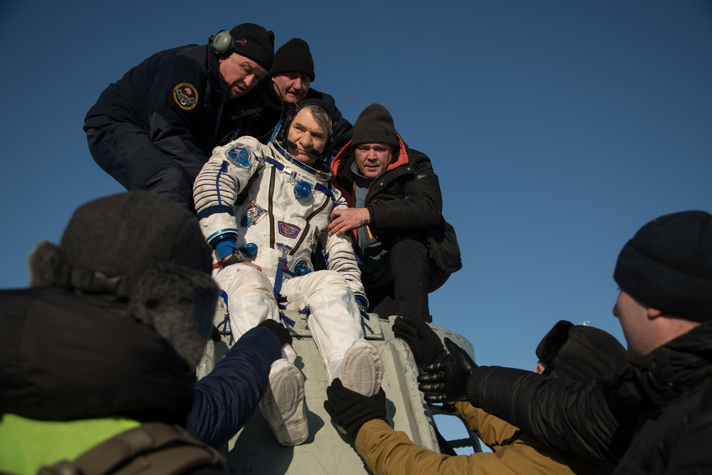  Paolo Nespoli is helped out of Soyuz MS-05. Credit: NASA/Bill Ingalls 