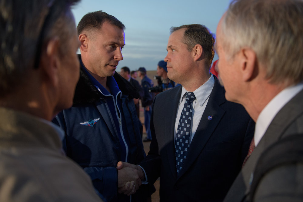  NASA Administrator Jim Bridenstine shakes Nick Hague’s hand after being recovered following the Soyuz MS-10 in-flight launch abort. Credit: NASA/Bill Ingalls 