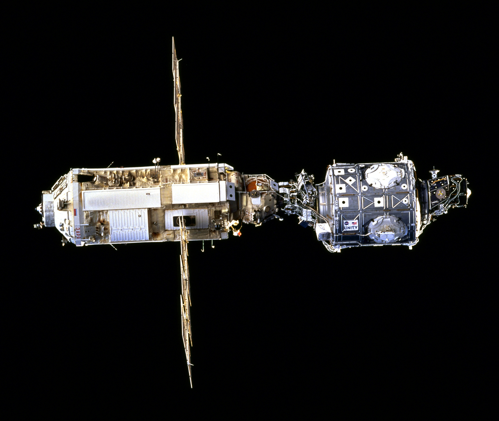  Zarya, left, and Unity as seen by the departing STS-88 crew in December 1998. Credit: NASA 