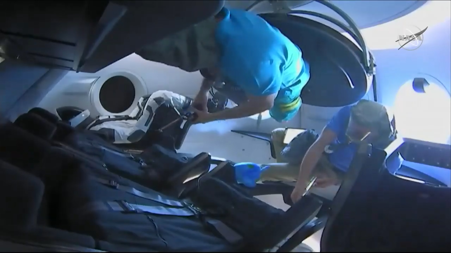 David Saint-Jacques and Oleg Kononenko were the first two people inside the Crew Dragon following hatch opening. Credit: NASA