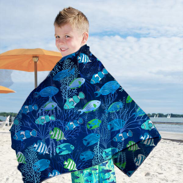 boy in beach-towel blue aqua fish copy.jpg