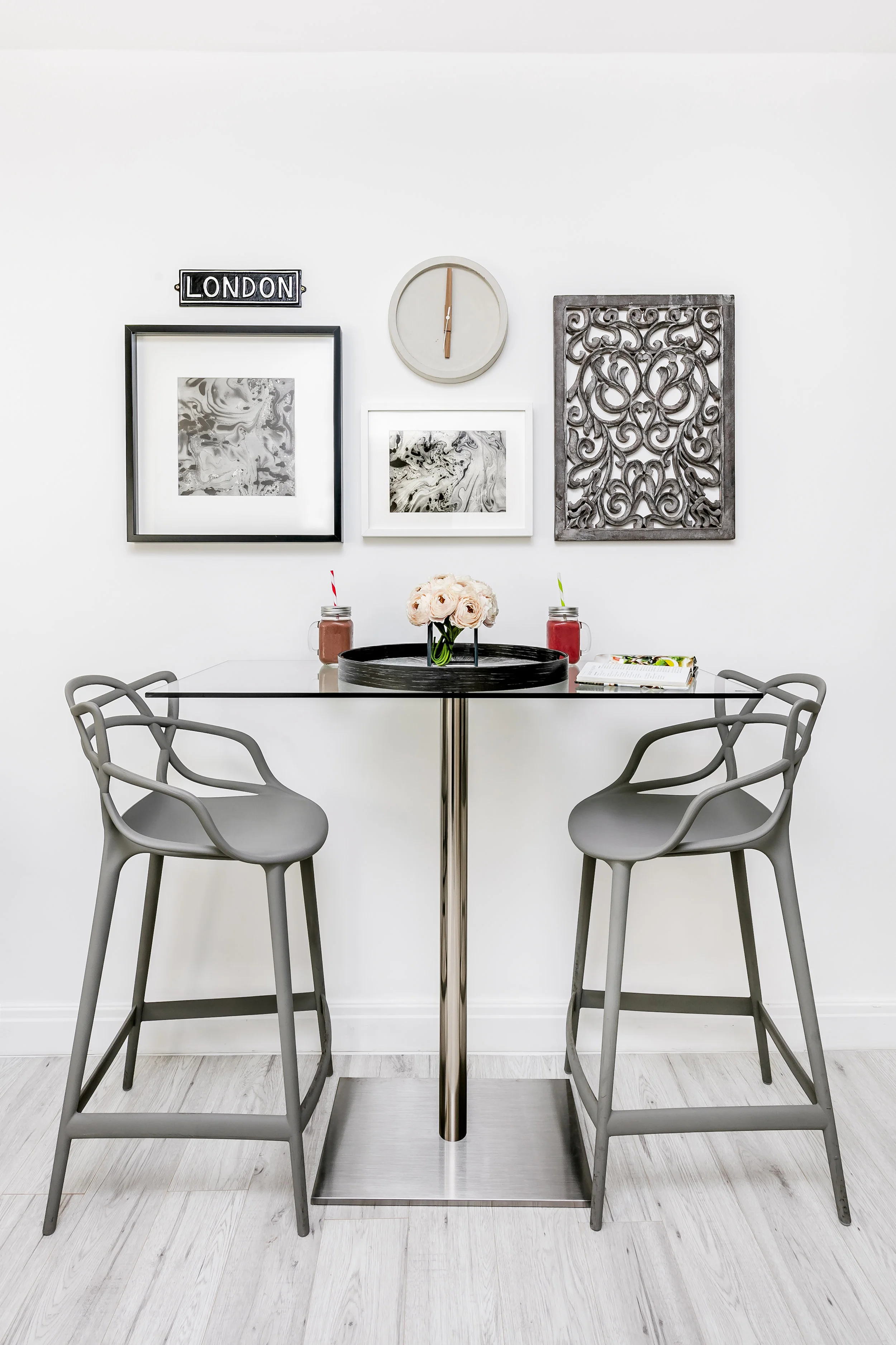 TIP - Arranging wall hangings around the Breakfast Bar focuses the space.