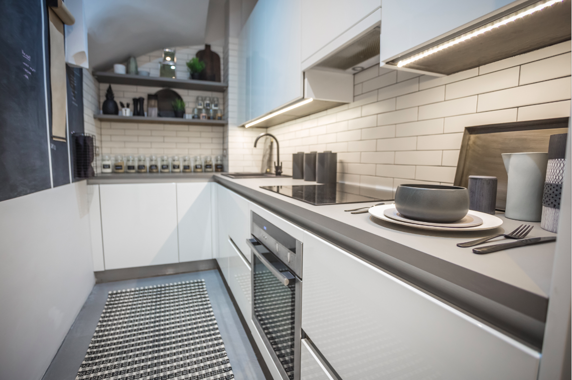 Tim's kitchen needed to economise its space so using a Galley design was the perfect solution.