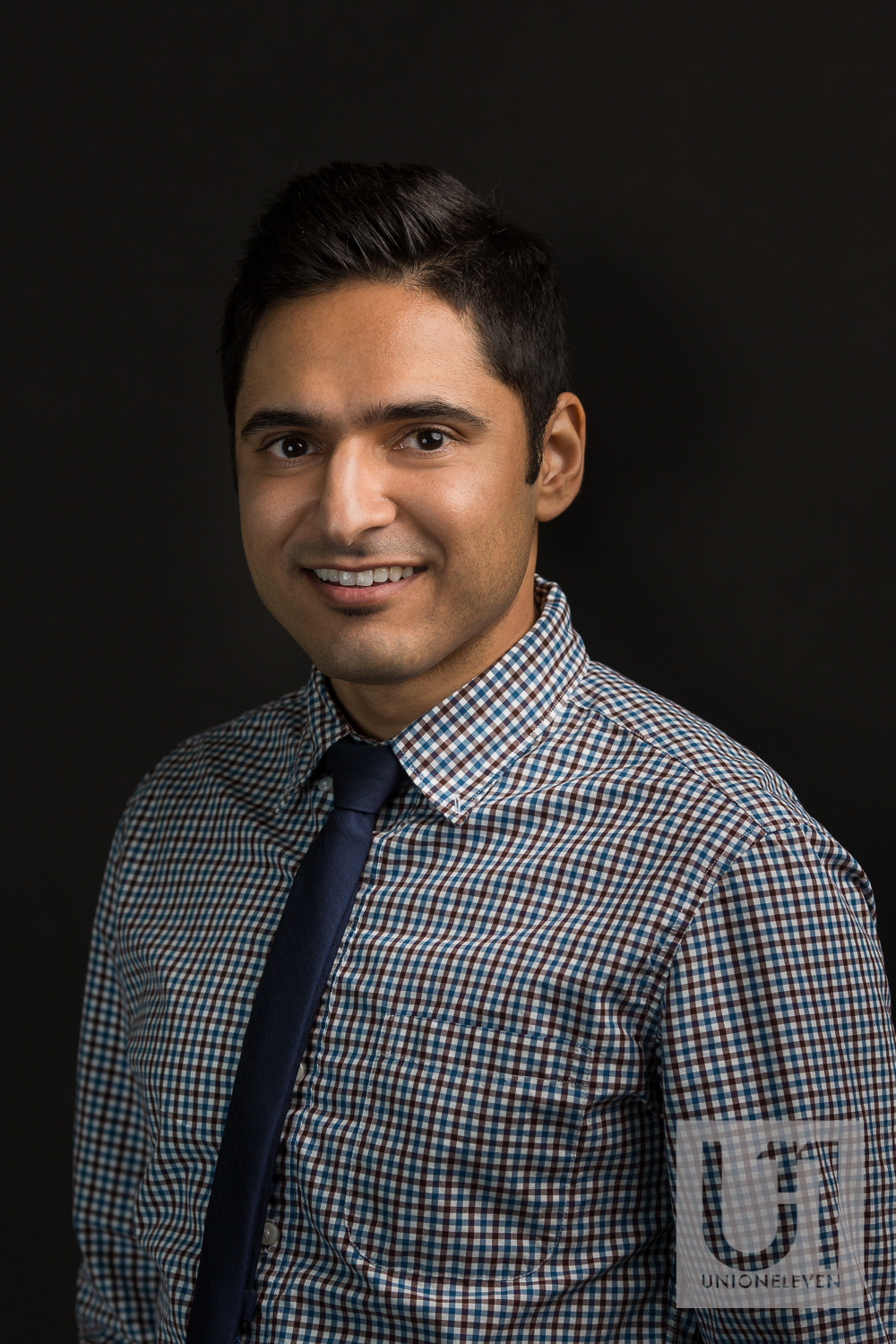 male portrait on a black backdrop