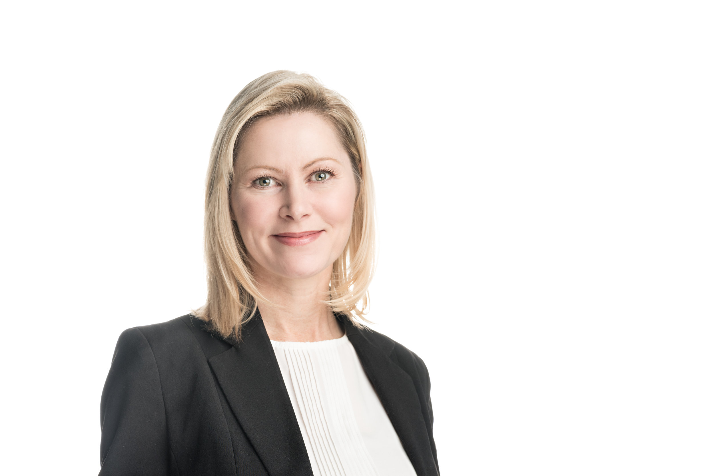 A professional headshot of a woman on a white background