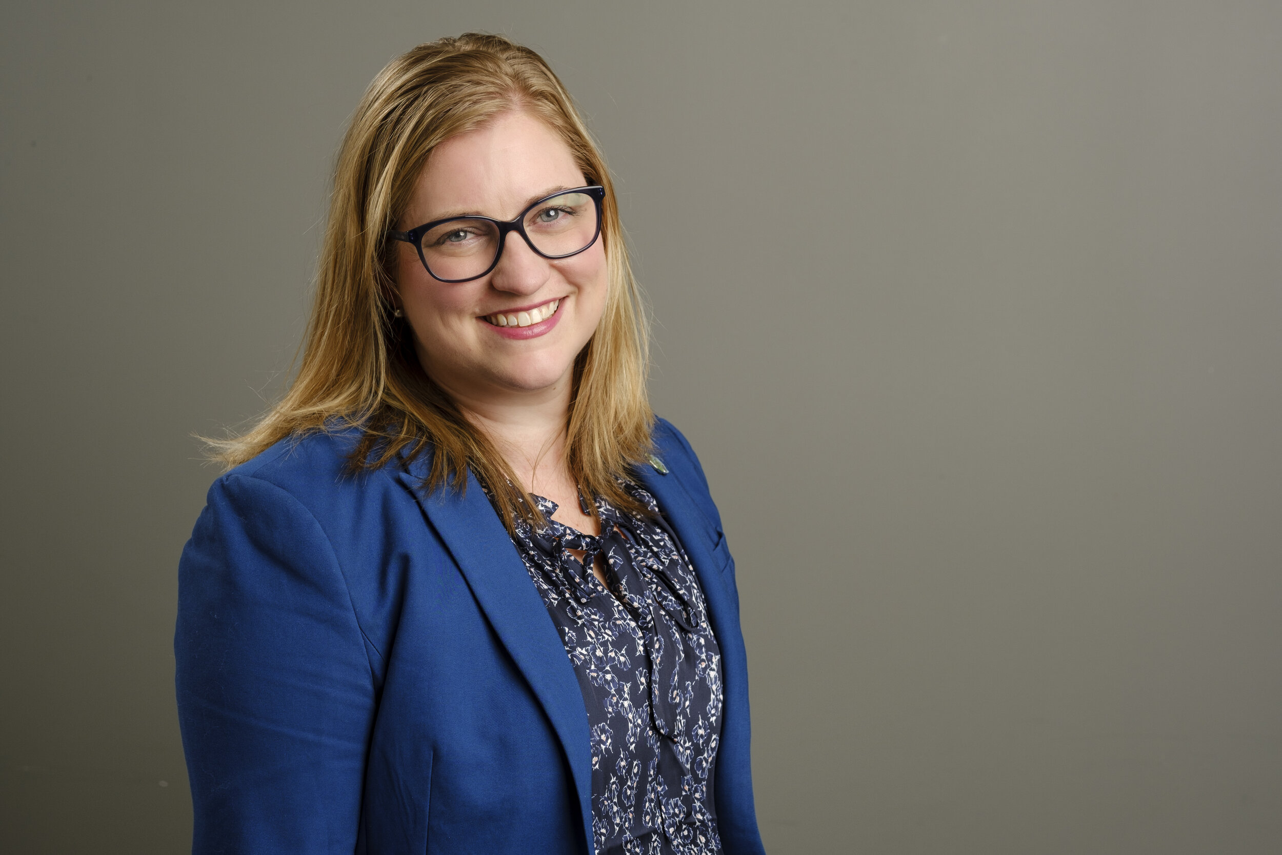 profession photograph of a woman on gray