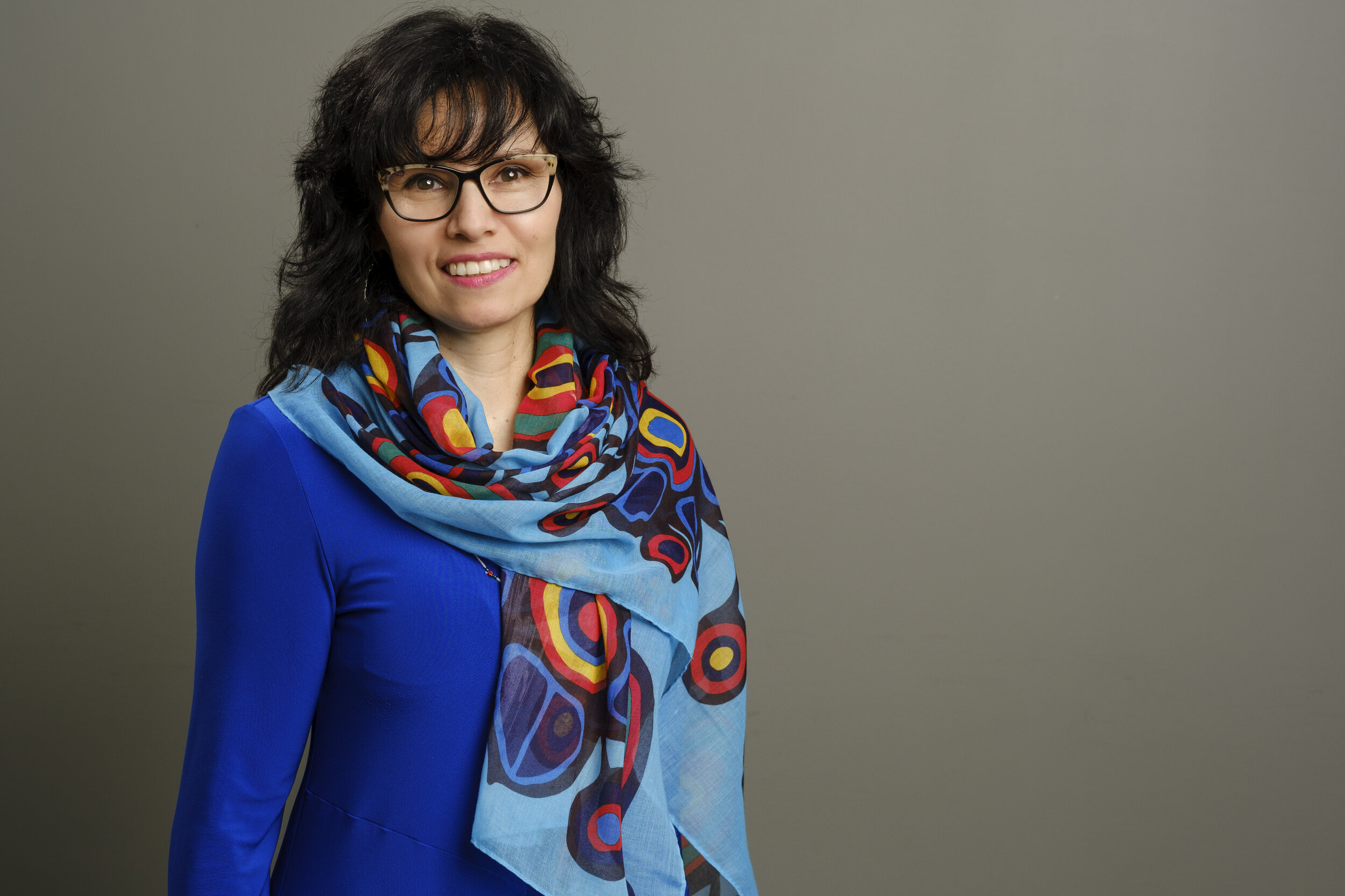 profession photograph of a woman on gray