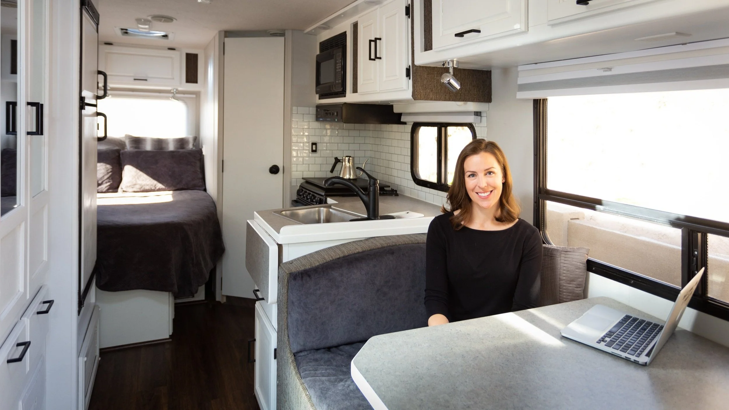 Aimee+Olson+-+RV+living+w_+laptop.jpg