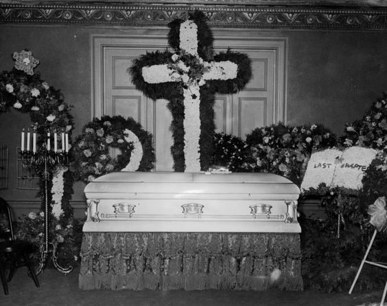   Gus Winkler 's floral adorned casket 