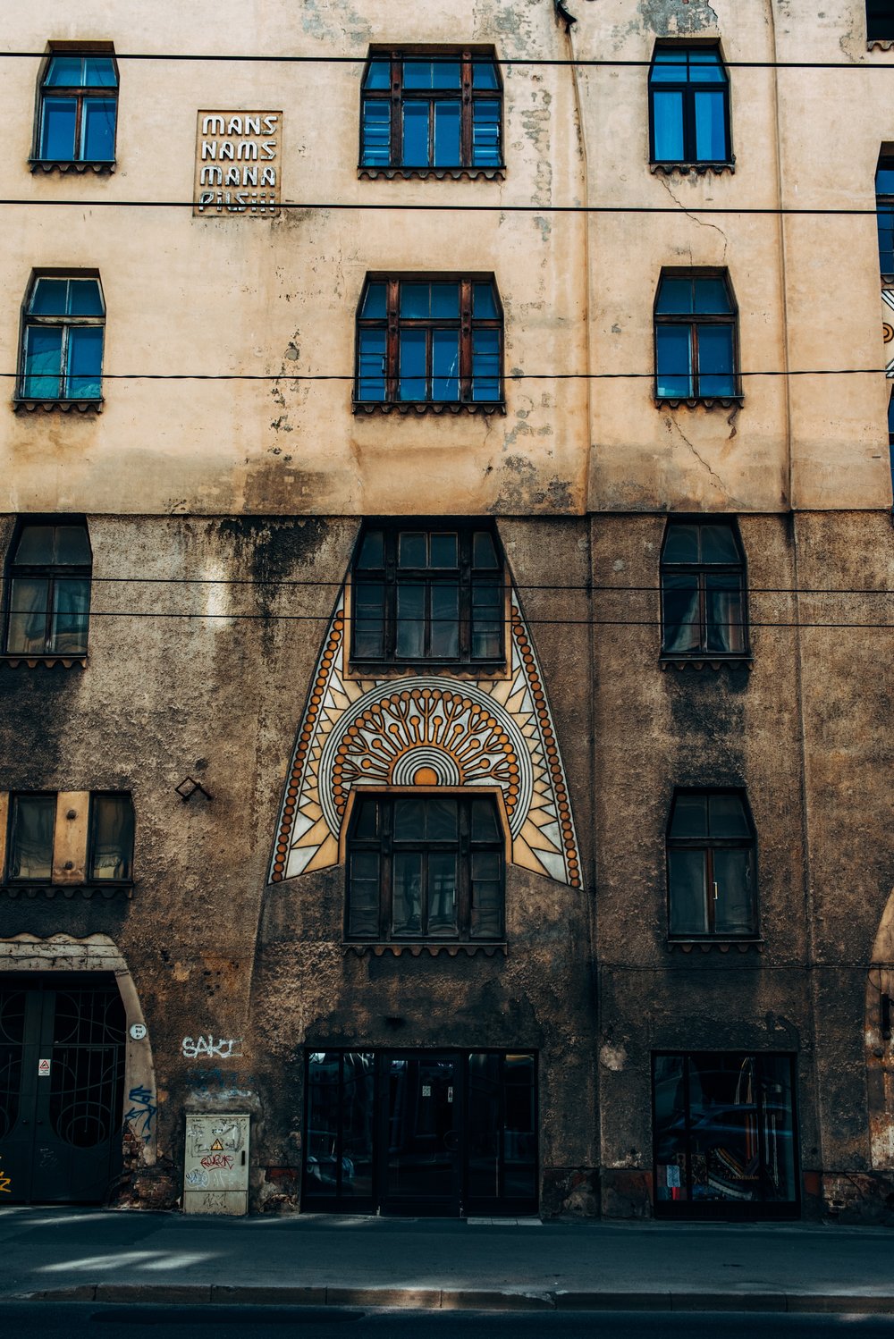 Lgbt Community Gay Club with Rainbow Flag on the Facade of a Brick