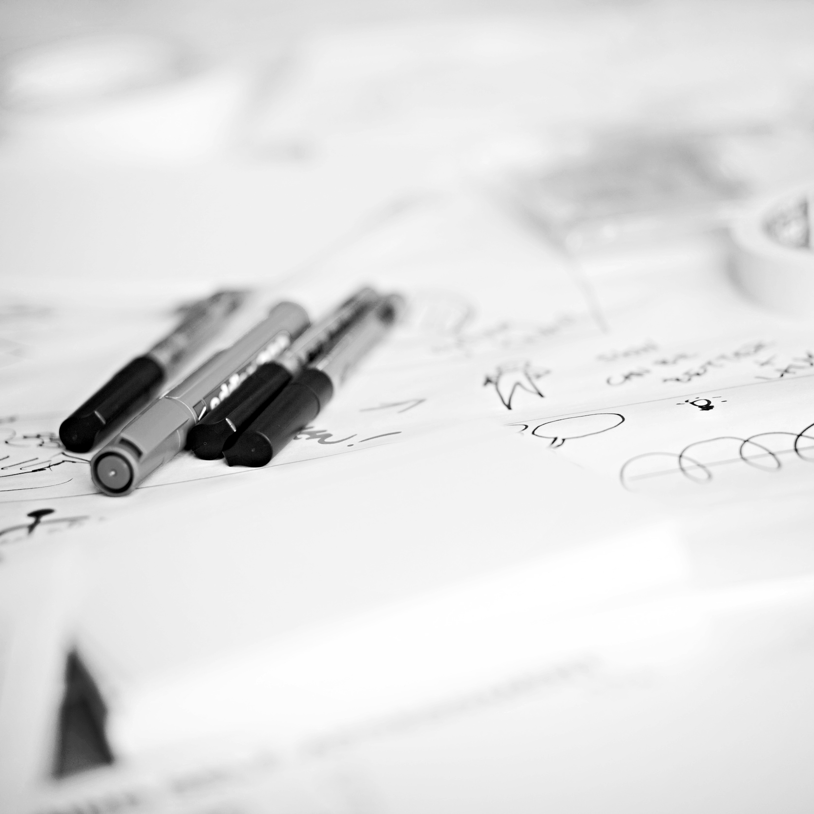 Paper and pens for sketching the customer journey,