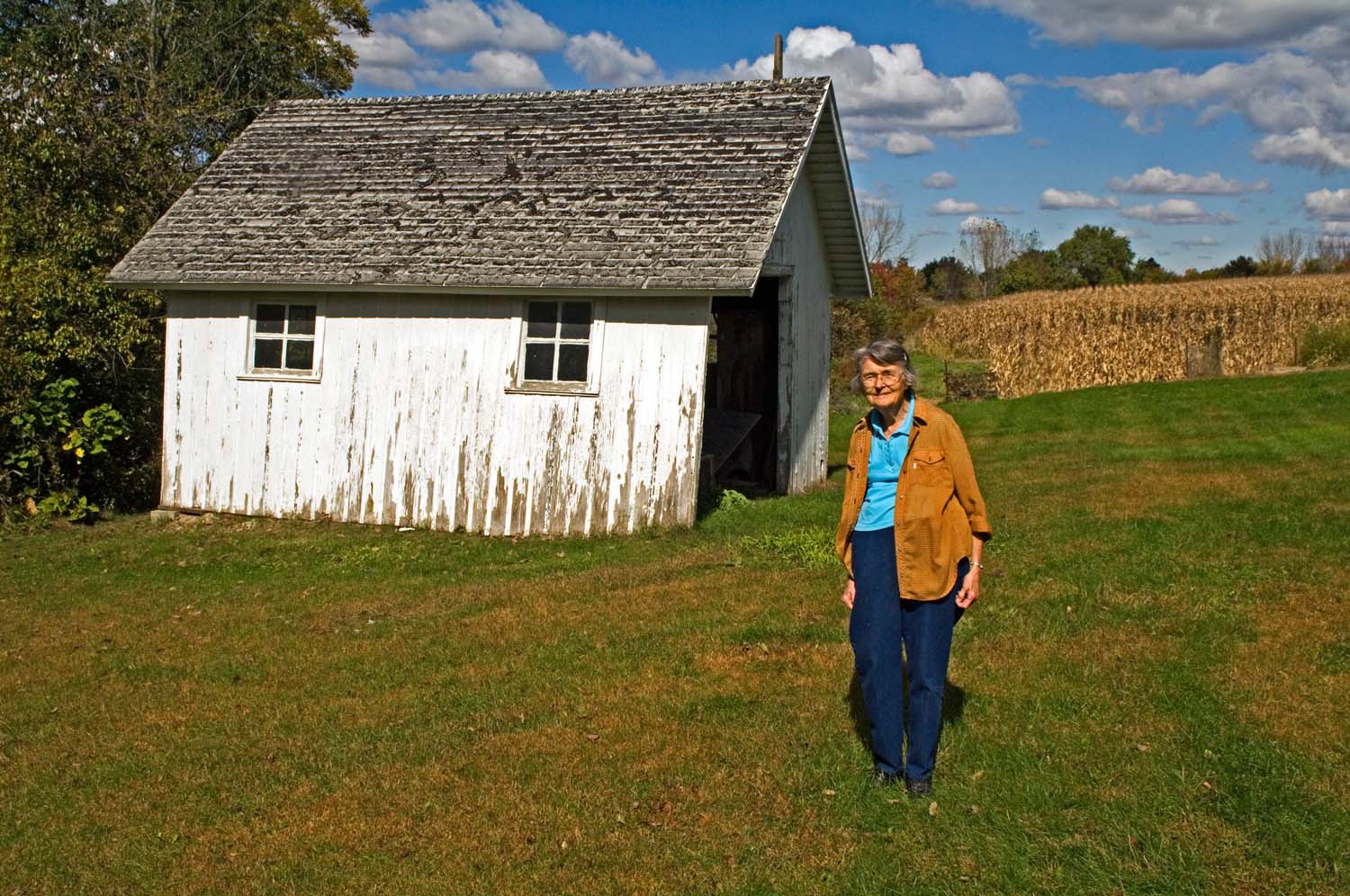  Mimi Lawton, standing in her yard. Plymouth, IL. October, 2009  