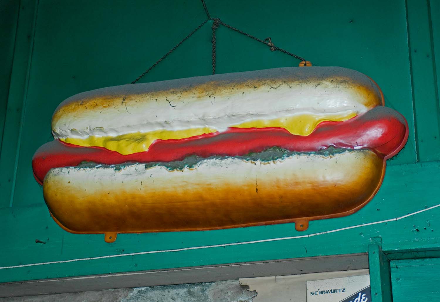  Large plastic hot dog sign hanging in an old general store. Huntsville, IL. February, 2008 