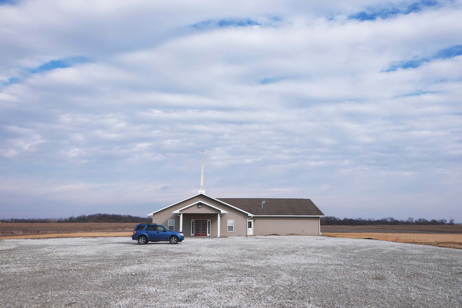  Small church with large parking lot. Plymouth IL February, 2016 