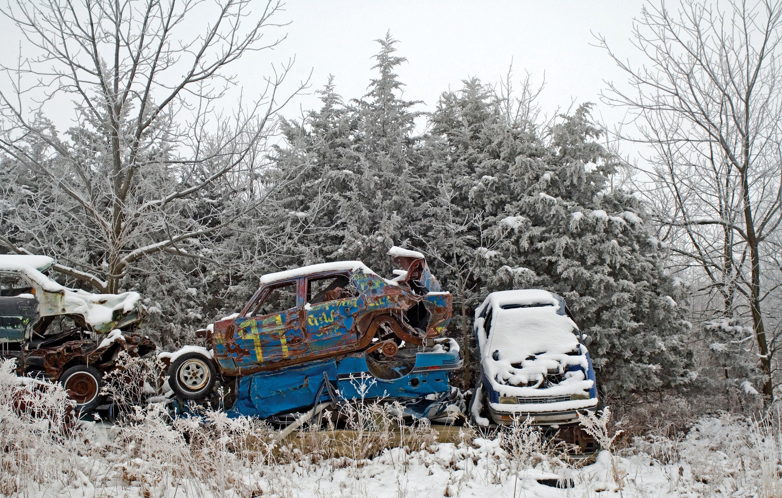  Winter scene of junkyard with cars. Augusta, IL. Dec. 2010 