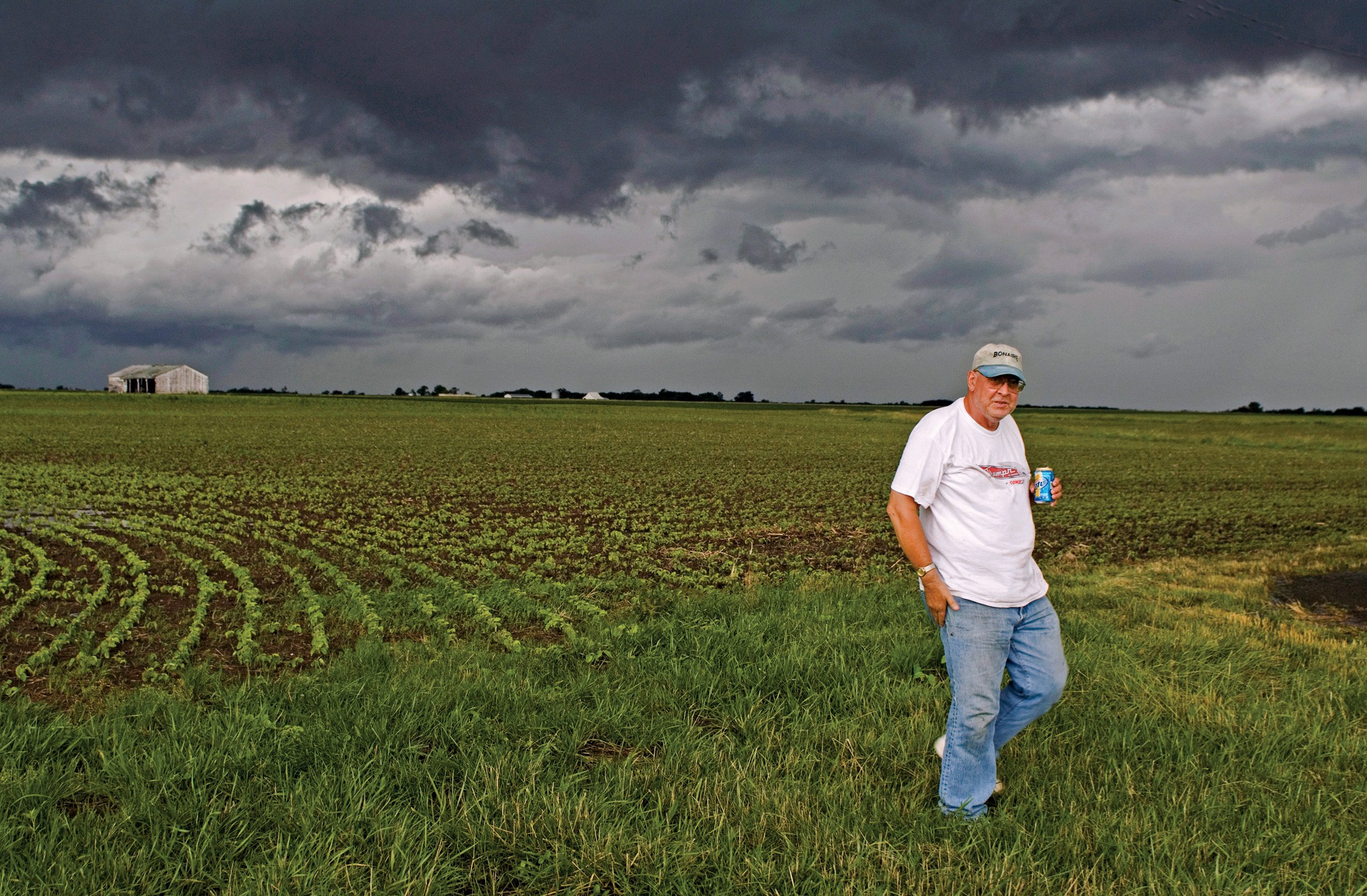  Brad Moormann, a truck driver, is Bruce's best friend. They were out storm chasing when this photo was taken. Hanncock County, IL. June, 2009 