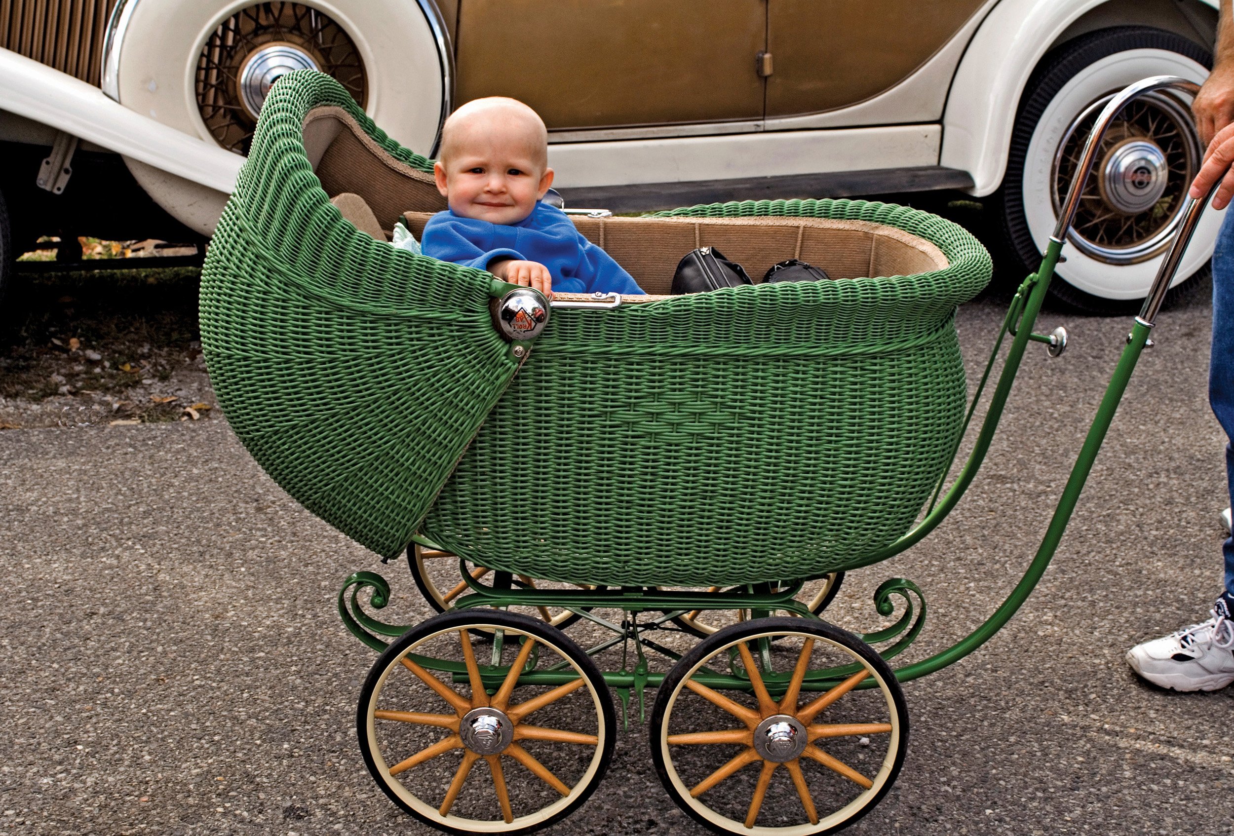  Unidentified baby in an antique wicker carriage, at the annual Newport Antique Auto Hill climb event. Antique cars, trucks and motorcycles make timed runs up a steep hill to a finish line 1,800 feet away.  Newport, Indiana. September, 2006 