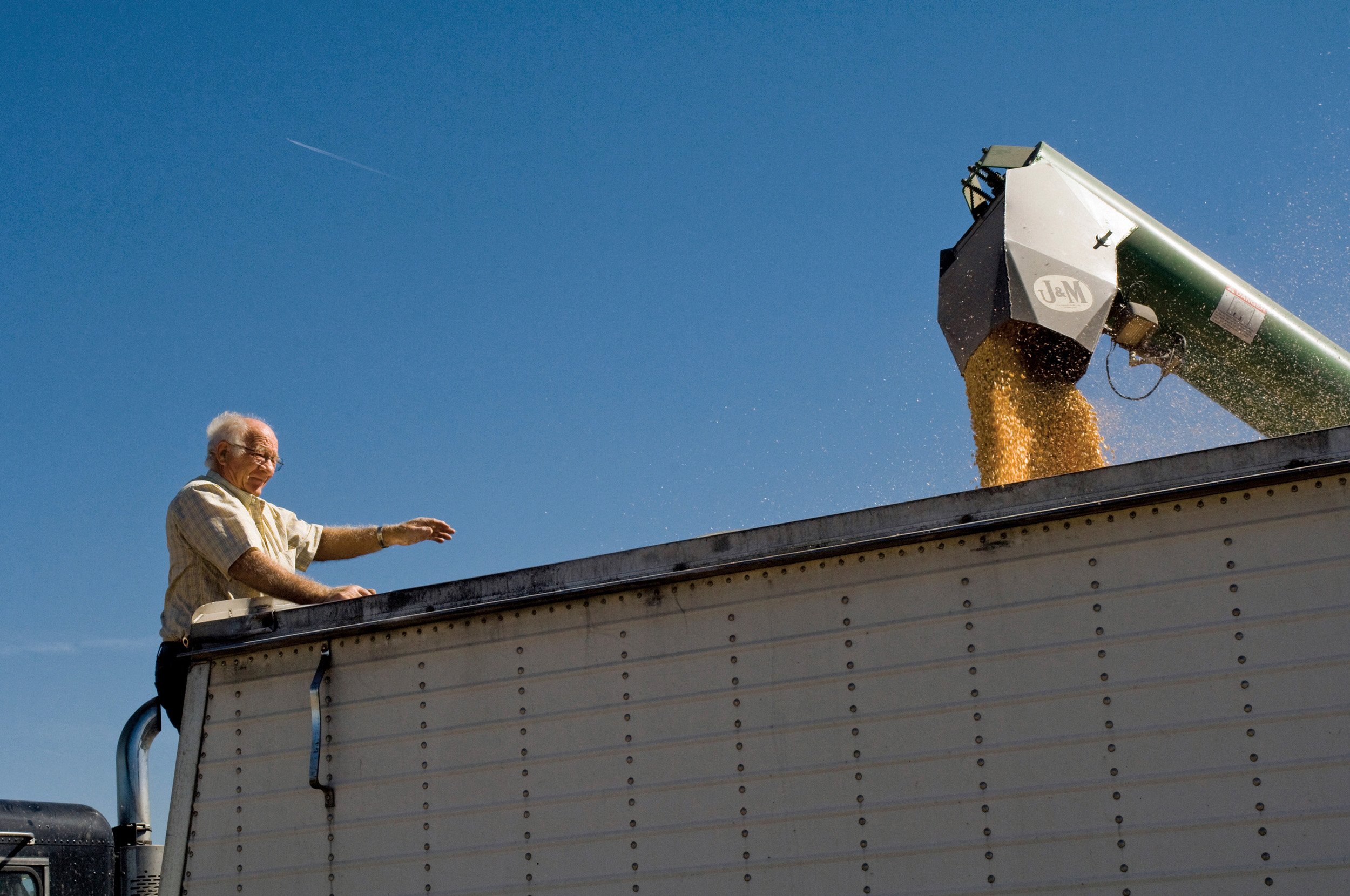  Truck driver who is filling up his tractor trailer with corn. Photo taken at Kenny Crossland’s farm where Bruce would often help with the harvest and plowing. Hancock County IL. September, 2007 