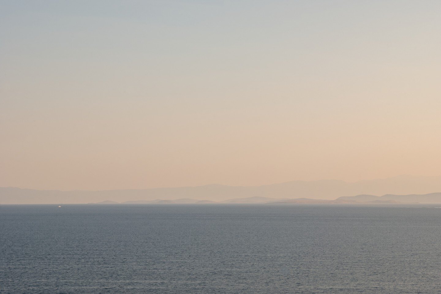 The same seascape across time, looking east from Lesvos to Turkey, 21 x 14 in, c-prints, 2018-2020. The poem is titled Translate. 

#landscapephotography #lesvos #refugeesupport