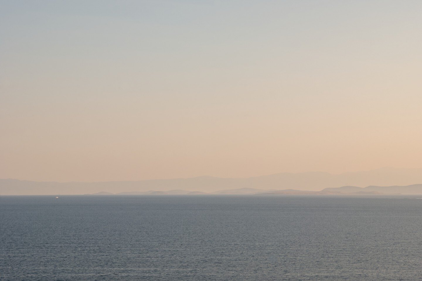 The same seascape across time, looking east from Lesvos to Turkey, 21 x 14 in, c-prints, 2018-2020. The poem is titled Translate. 

#landscapephotography #lesvos #refugeesupport