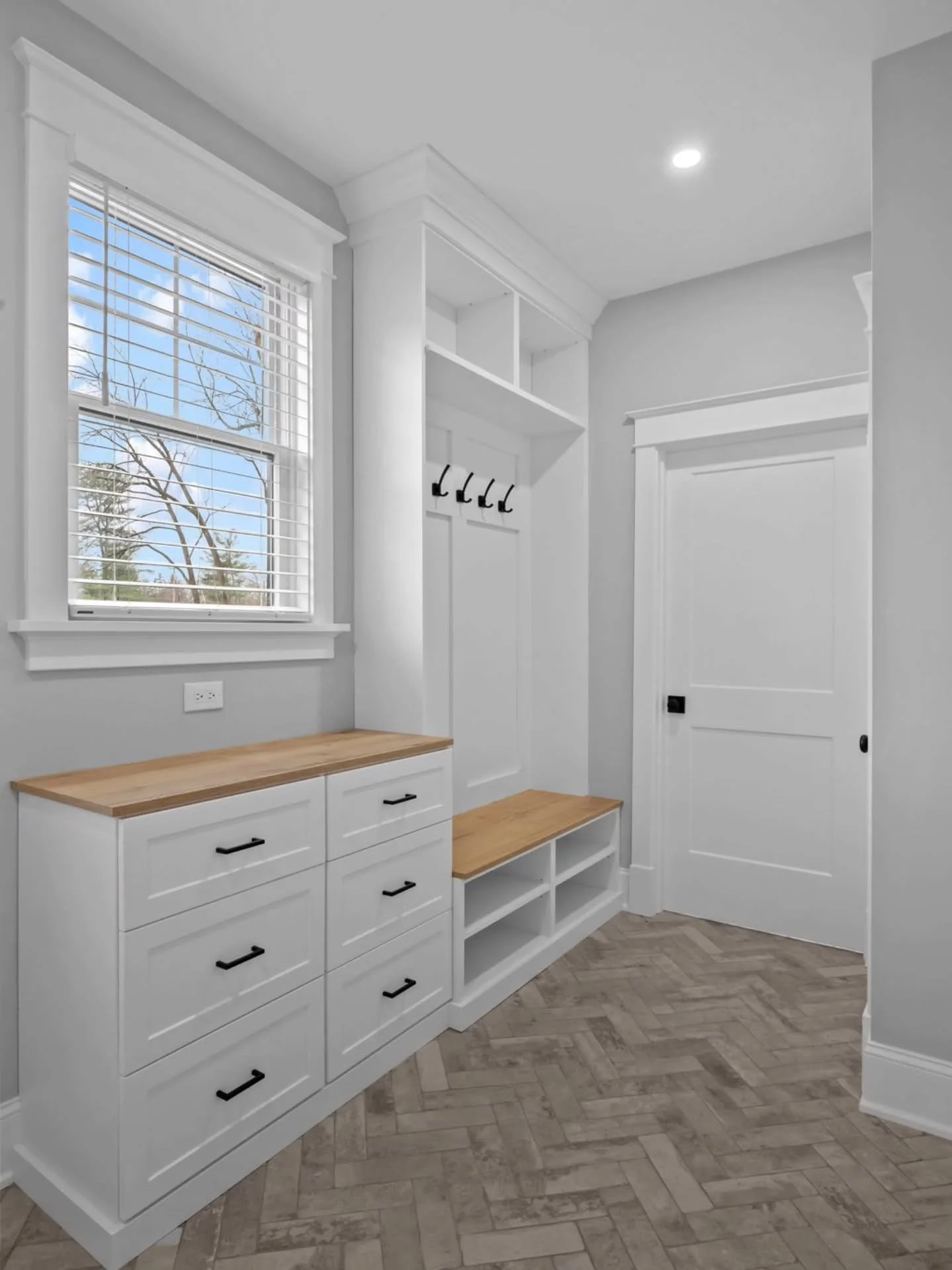 A mudroom with a functional drop zone is a must for any busy family - creating
the physical and visual transition from the outside to the inside of a home.

Architect: Cunningham Architecture 
Builder: Great Estates
Photographer: Mike Sperando Photo 