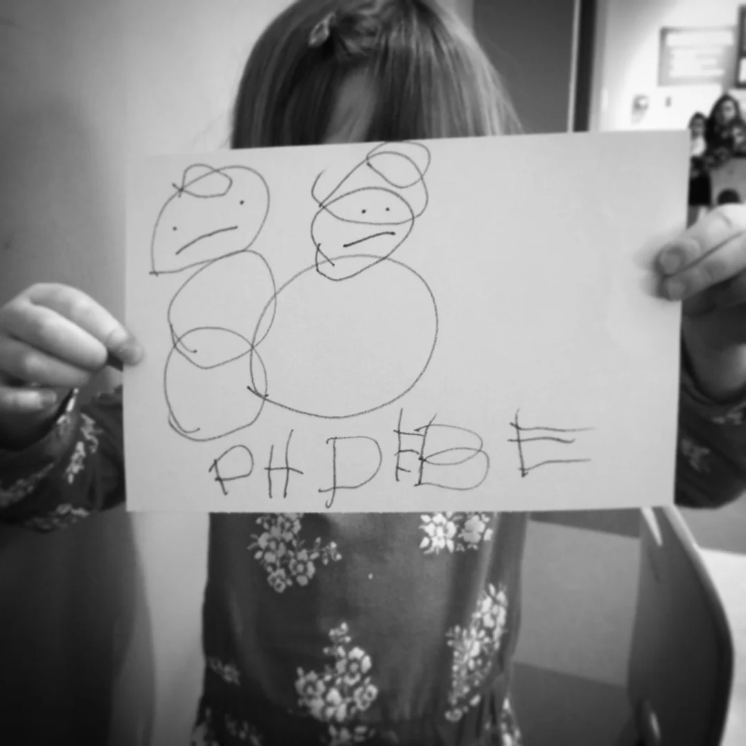   Phoebe. Drawing of her and Frosty Playing. 12-21-16.  