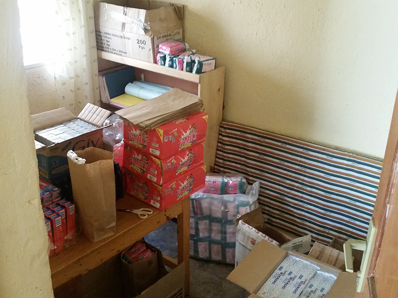 Creating the packages of personal items: bath soap, laundry soap, lotion, toothpaste, and Kotex (for the girls)!
