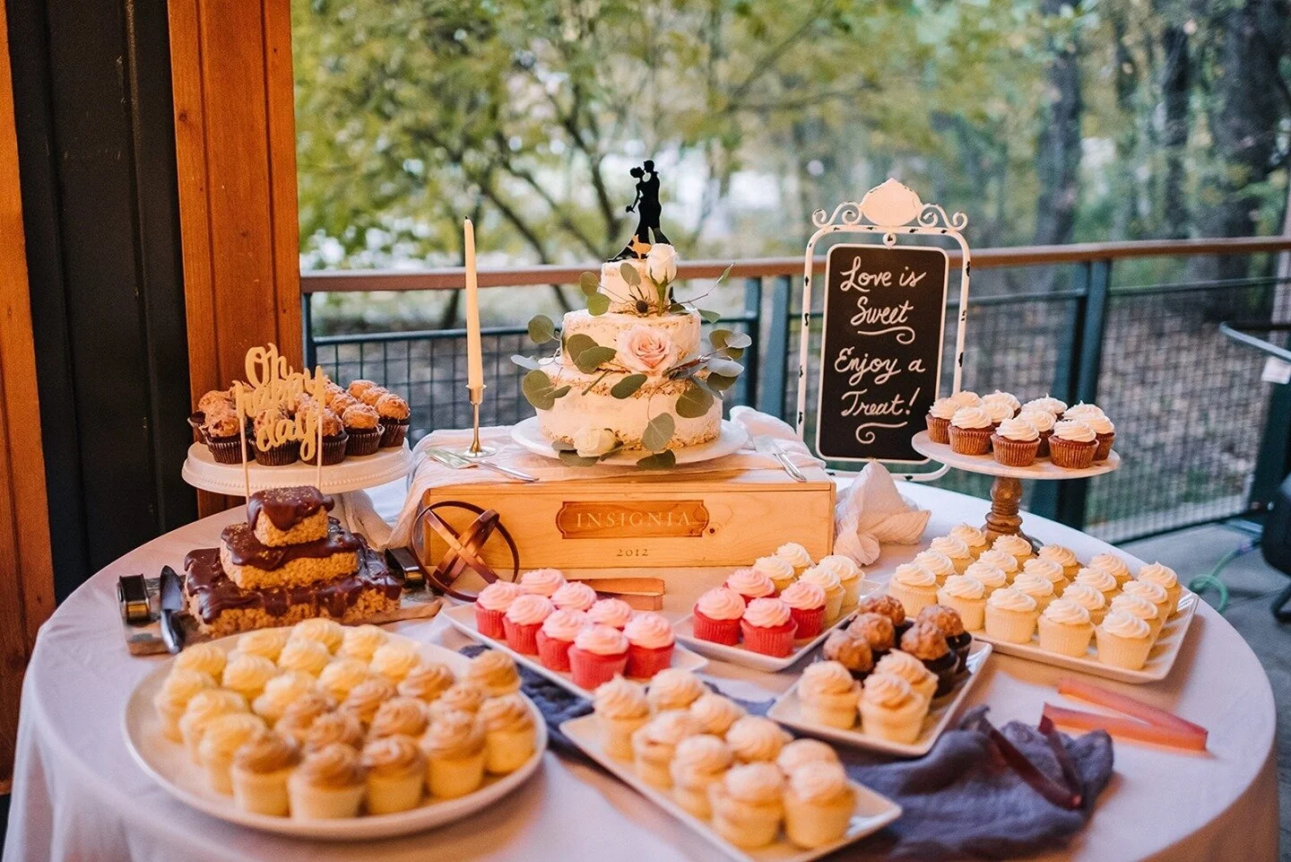 Love the options on this treat table! 🧁 If you could only pick one, which would you choose: a slice of cake, a cupcake, or some of those rice krispy treats? 😋⁠
⁠
❤️: @maddie.latti.lacroix⁠
💛: @ryan_j_lacroix⁠
📋 + 💐: @connorandcoevents