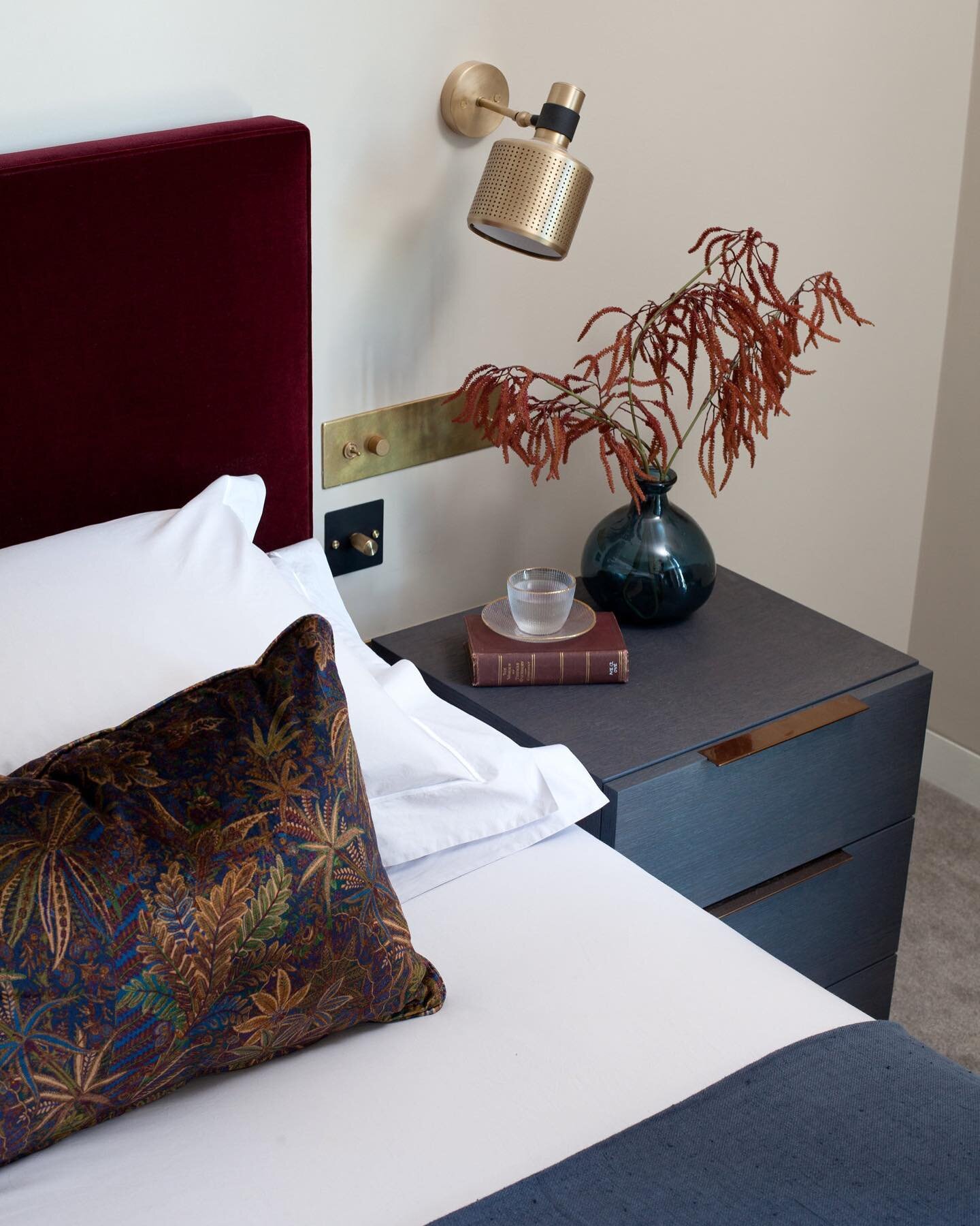 A refined bedroom scheme at our Gasholders projects in Kings Cross with @libertylondon fabric on the cushion and @bertfrankltd wall light. @kingscrossn1c #gasholderskingscross #gasholderslondon #libertyfabric #libertyfabrics #bertfrank 
Photography b