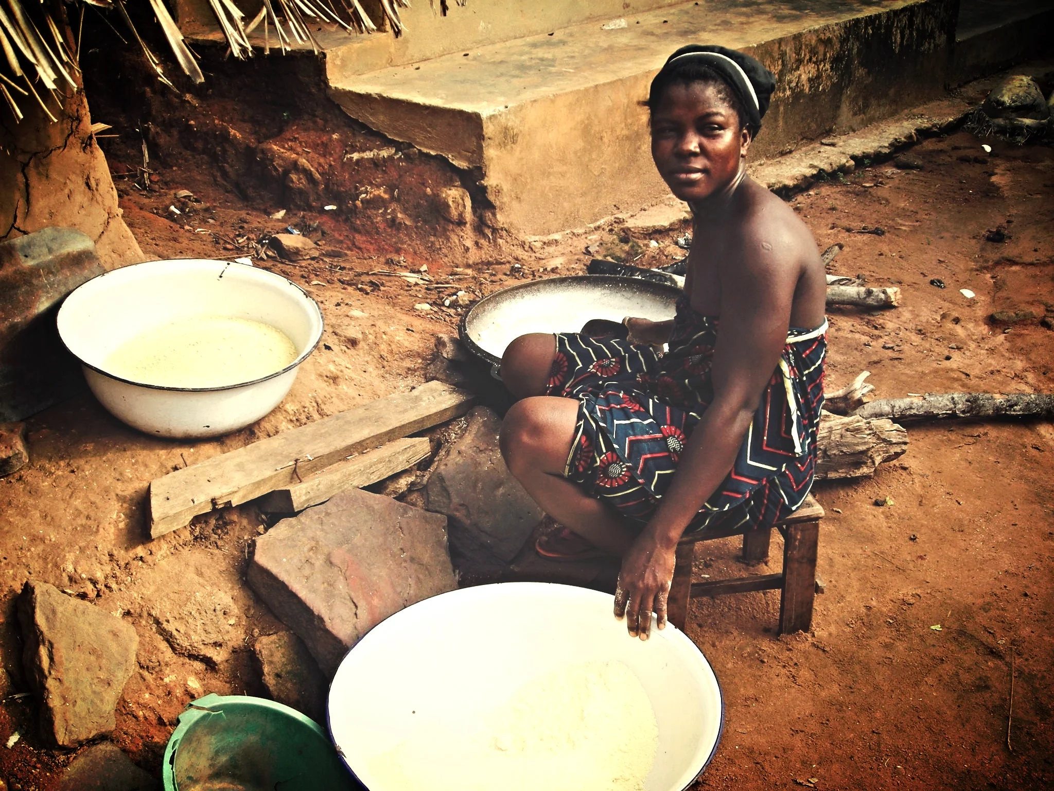 Ututu Woman Preparing a Meal