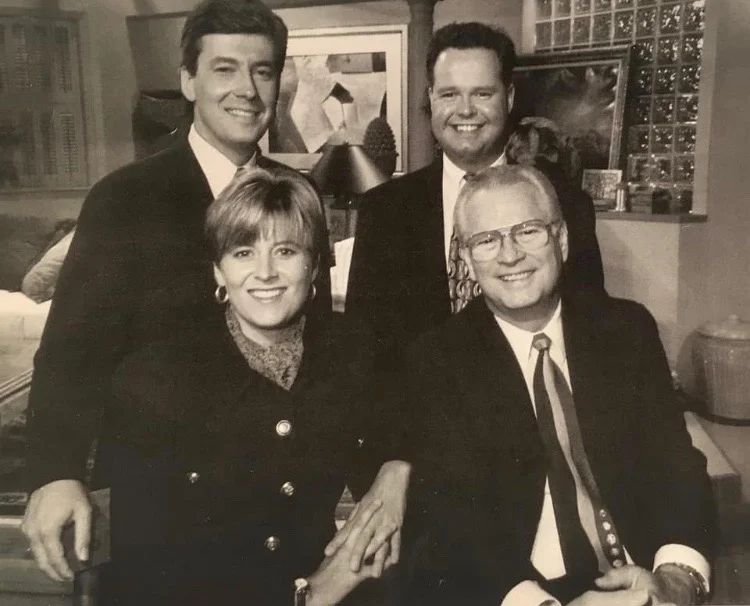 After five years together, sitting next to Lee Kinard (front), a mentor for all. With news anchor, Brad Jones (upper left) and meteorologist, Ed Matthews (upper right).