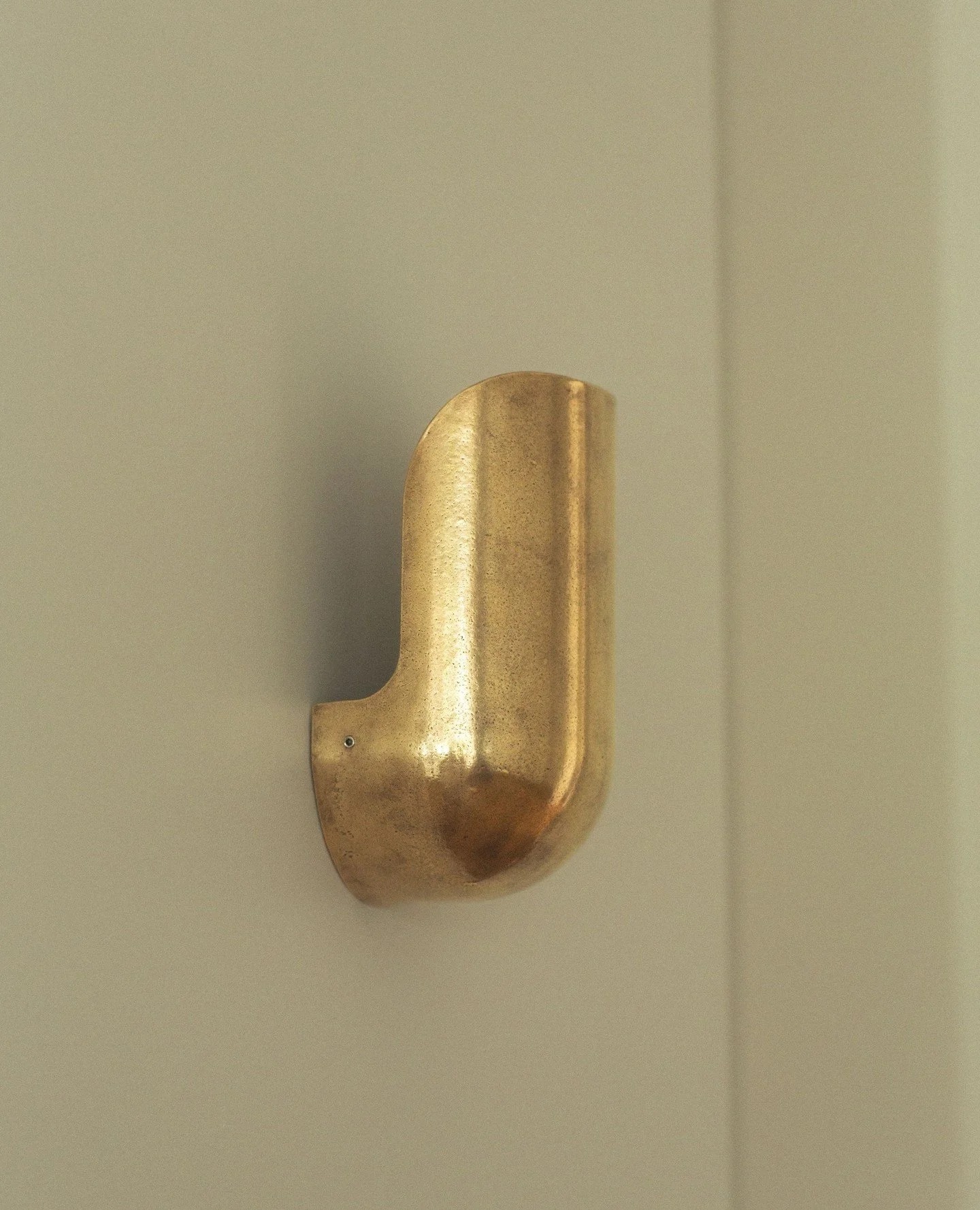 ELBOW WALL LIGHT - The Elbow Wall Light by Henry Wilson is a modern work of art, crafted to provide a refined, luminous touch to any interior. Available in both Narrow and Wide profiles, its classic silhouette and metal construction lend an elegant, 