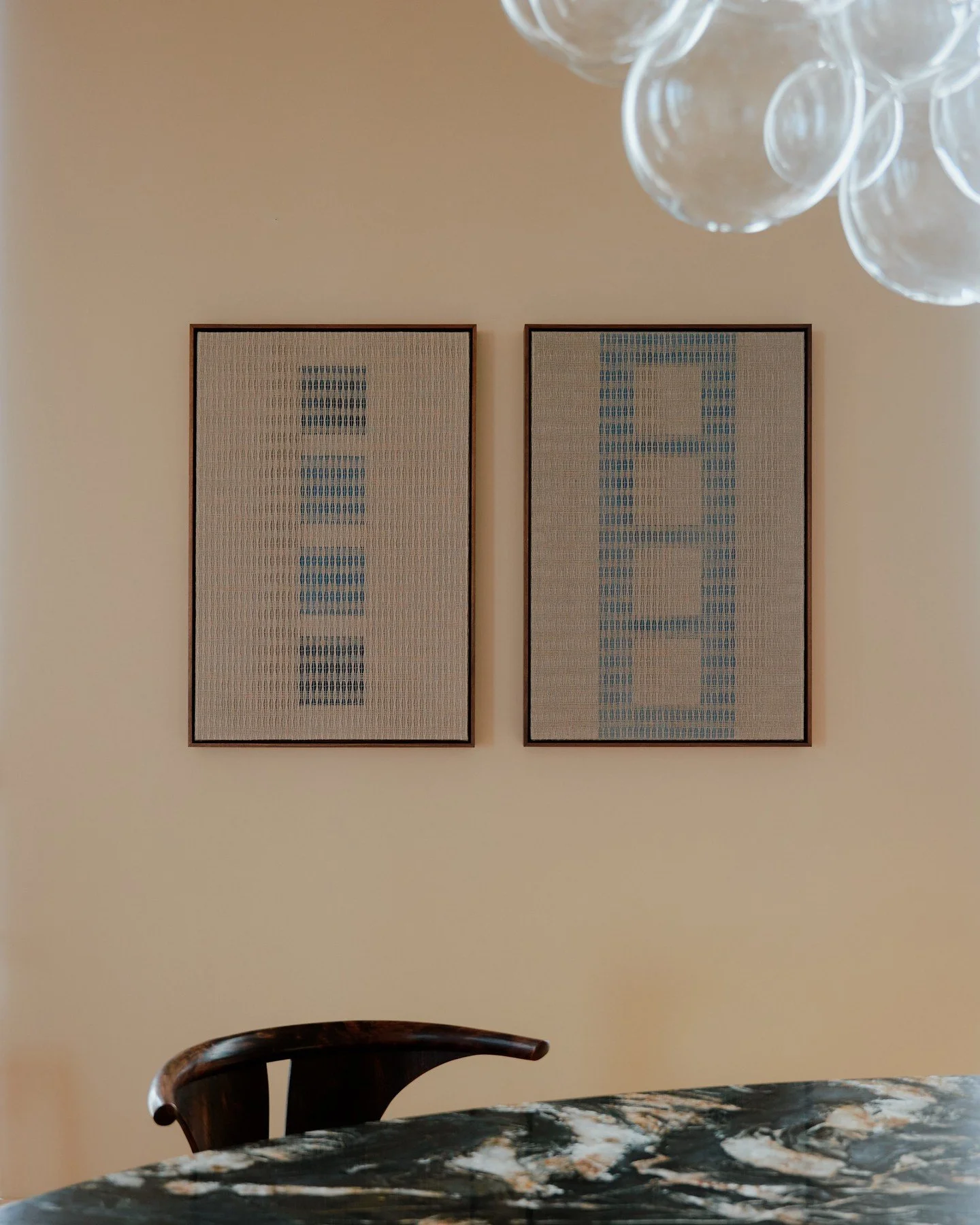 SEQUENCE OF SQUARES I &amp; II (blues) - Stretched and framed, the works function more like tactile paintings than traditional wall hangings. Their strength lies in their duality: precision and softness, repetition and variation, restraint and presen