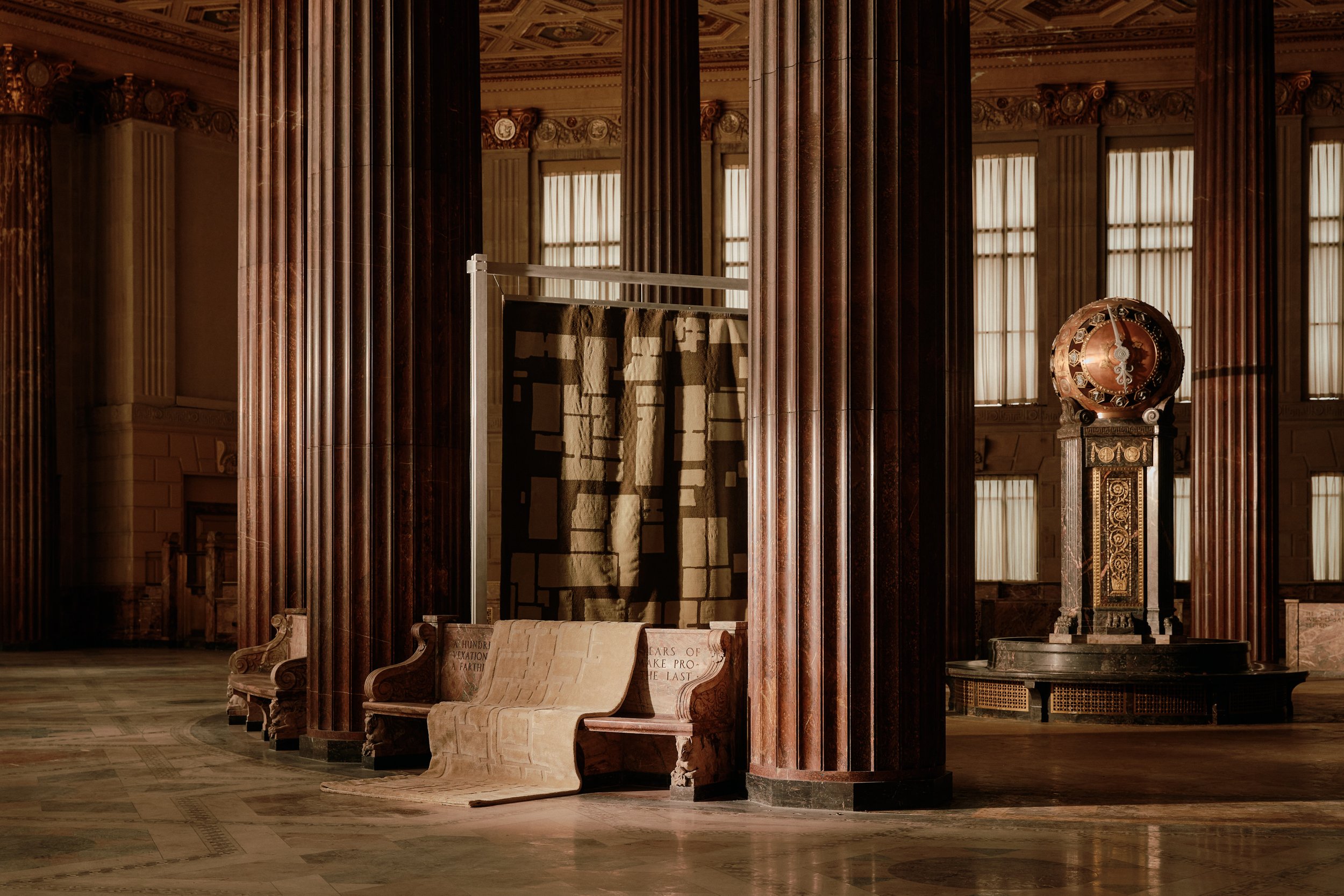 The Laberintos 01 and 02 low rugs designed by Lucas Cantu for Radno̲r Made on display in the historic Dime Savings Bank