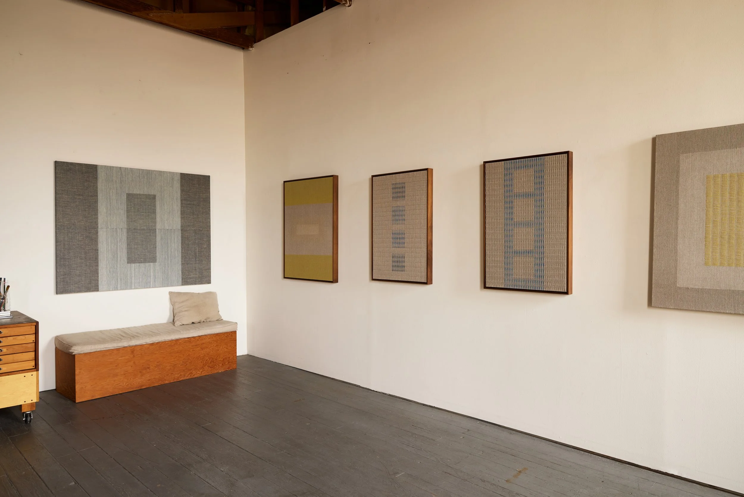 Woven artworks by Rachel DuVall in her art studio