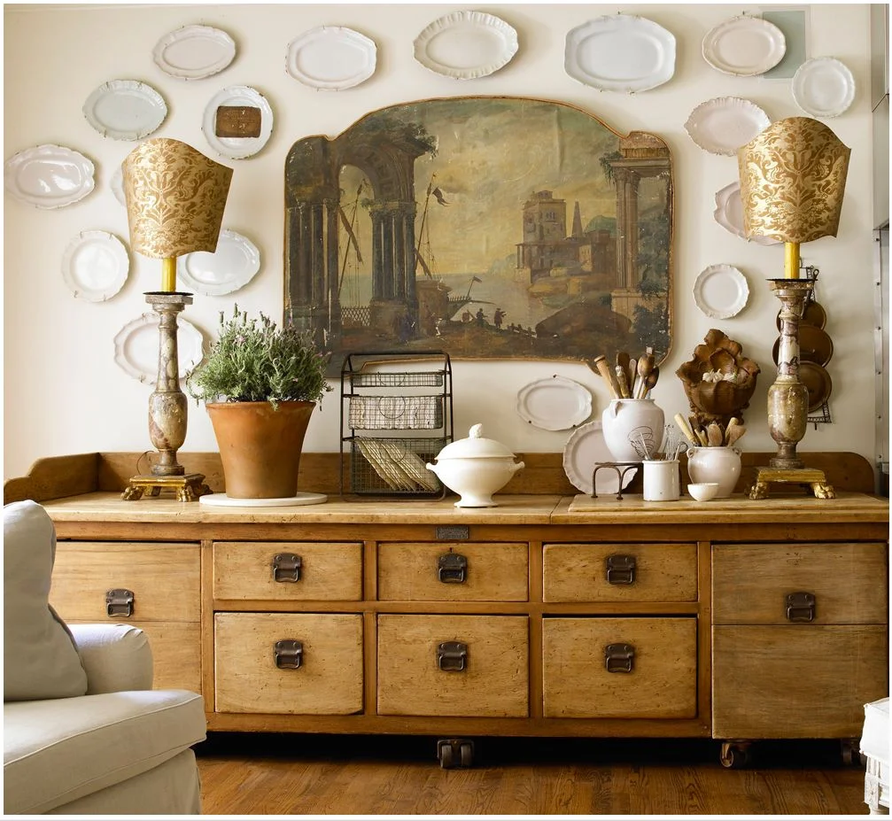 What do you think of this antique baker's counter that stores culinary supplies with utensils in jugs on top?