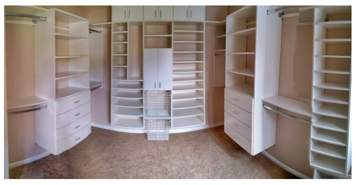 An efficient master closet design. You can take cabinets all the way to the ceiling and leave open space for tubs or baskets that provide easy access.