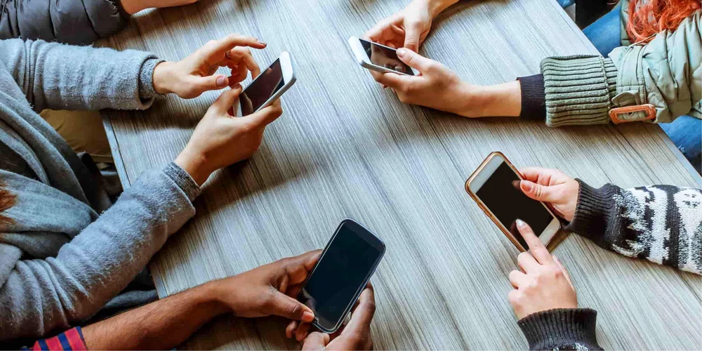 By Opening the Door to Cell Phones, Are Schools Also Feeding an Addiction? - NEA