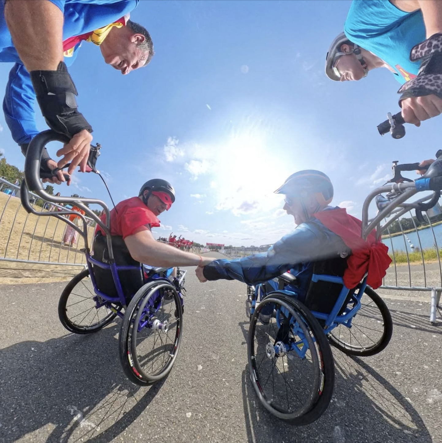 Our Wheelchair users crossing the line at the Superhero Tri event. A great day for disabled people and their allies to enjoy accessible sport.