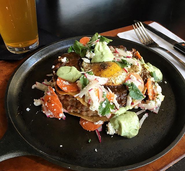 Our patio and kitchen, like our hearts and minds, are open to you this morning. @_joe_herrmann created a chicken mole tostada for brunch that comes with an egg, avo crema, queso fresco, and goes great with beer. #saturdaybrunch #CPorDIE #goldenhill #