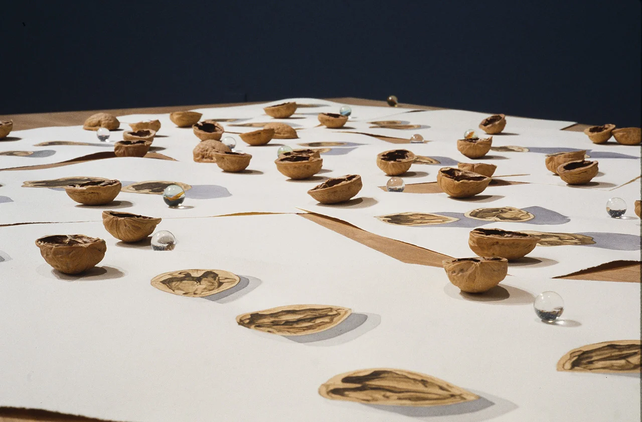 Games of Chance , 1996, watercolours, walnut shells, marbles, cherry wood table.