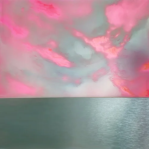 White clouds and pink sky hover above a silver sea.
